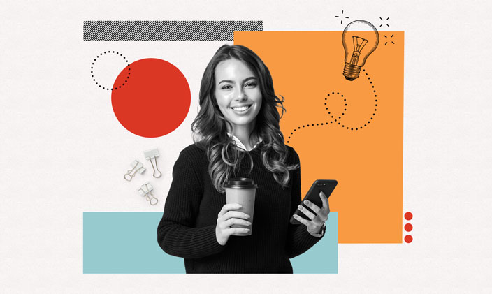 Millennial woman smiling with a coffee and phone in her hand