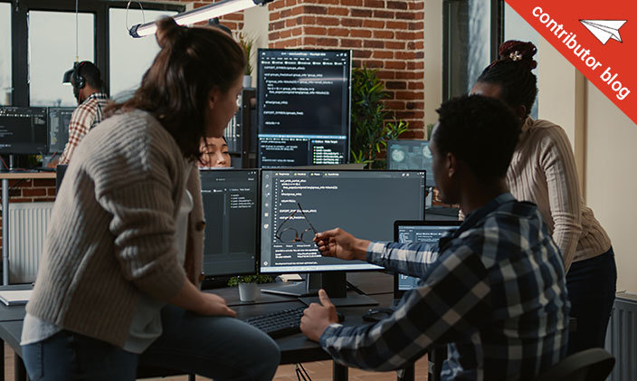 Coworkers in an office overlooking AI in the workplace