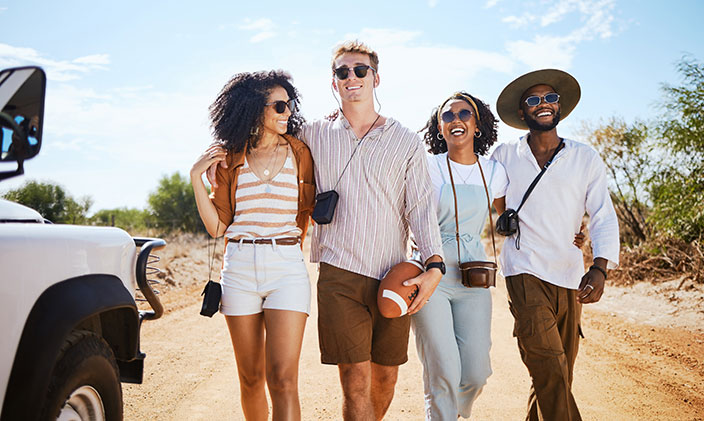 Friends enjoying vacation time on a desert walk