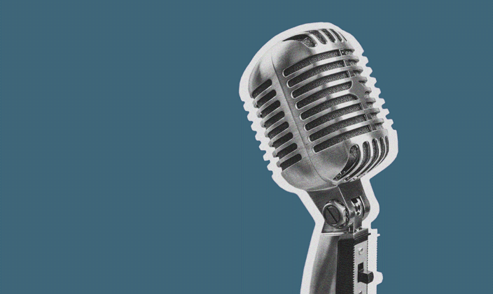 Silver microphone on a stand against a teal blue background. 