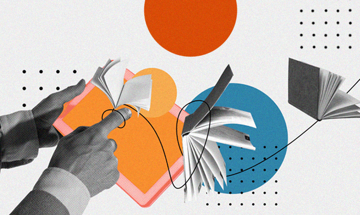 An open book with a man's hand pointing at one of the pages.