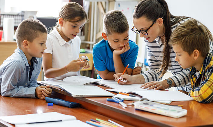 An aspiring elementary teacher gains experience in the classroom
