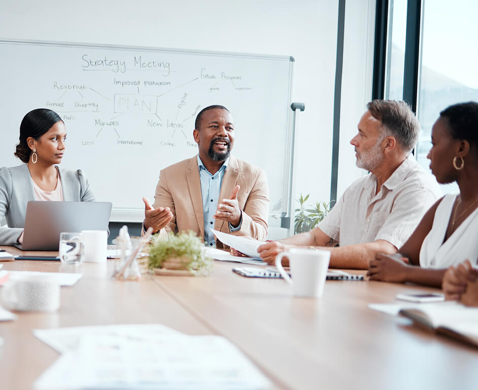 Image of a group of employees in a meeting